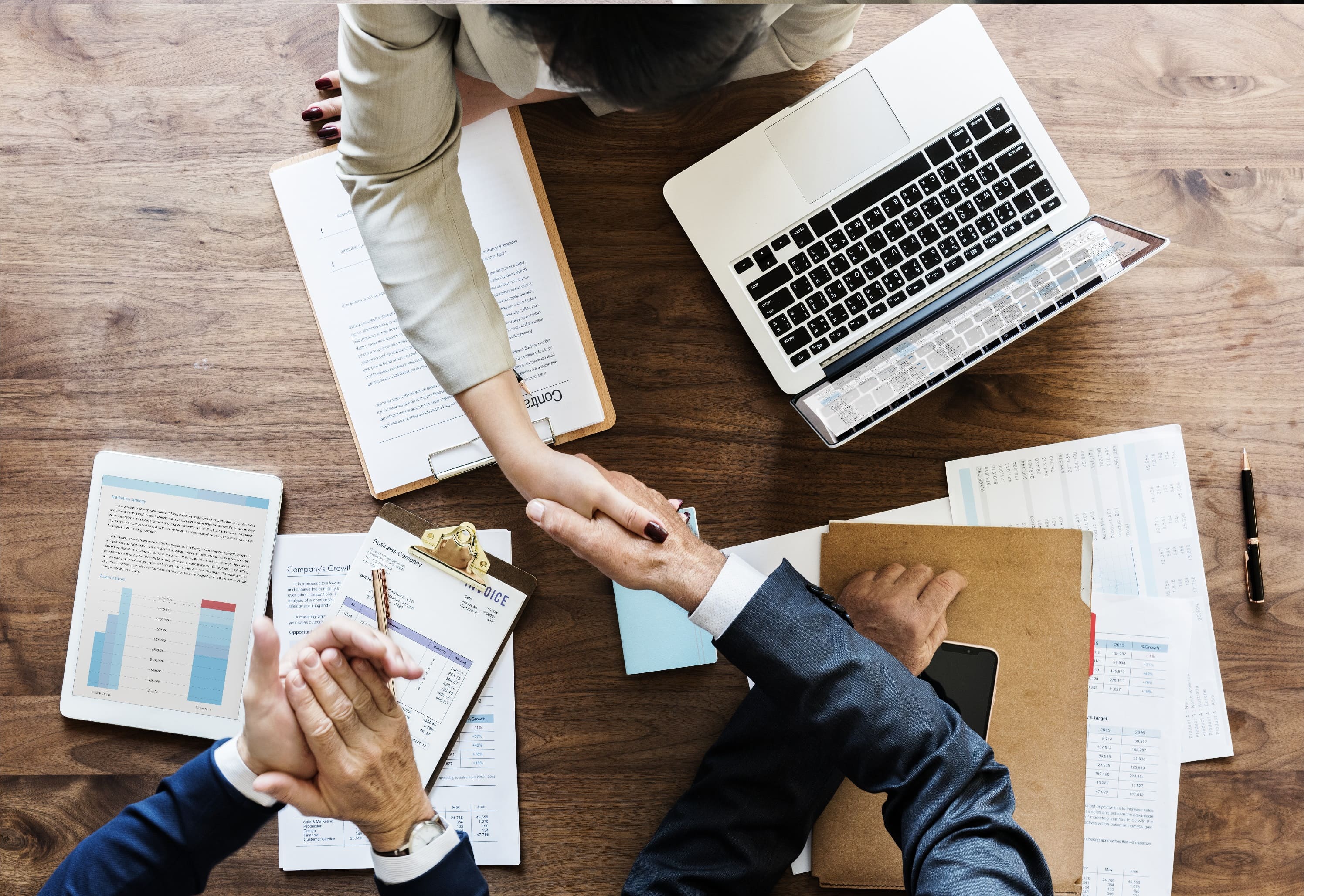 business-people-shaking-hands-together2 (1).jpg